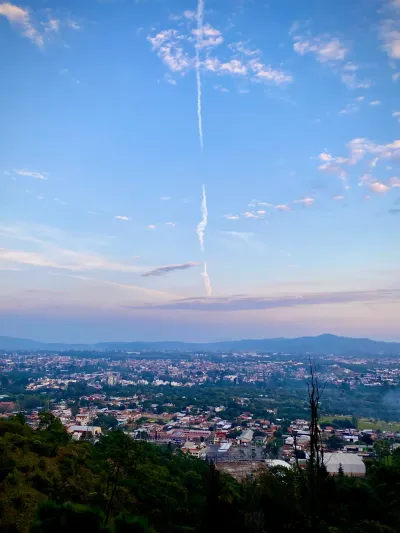 Vapor Trail Over Town